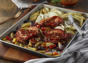 Sheet pan pork chops with root-vegetables and beer and pancetta sauce